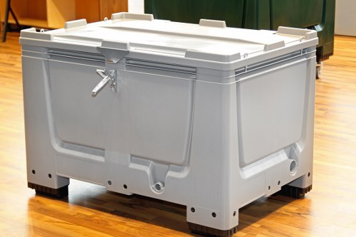 Workers handling bins during a rubbish collection operation